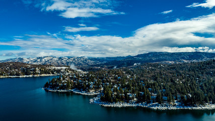 Aerial, drone view of Lake Arrowhead, California on a winter's day after a snow storm
