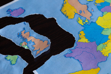 A torn paper map symbolizing the UK leaving the European Union also know as Brexit