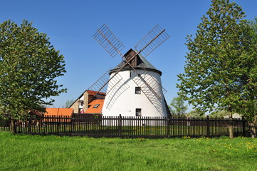 farmhouse with old windmill,Czech republic