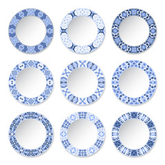 Set of decorative plates with a circular blue pattern, top view. White background. Vector illustration.