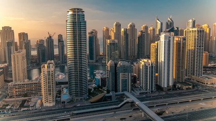 Fototapeta na wymiar Beautiful aerial top view at sunset timelapse of Dubai Marina and JLT in Dubai, UAE
