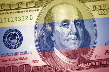 flag of venezuela on a american dollar money background