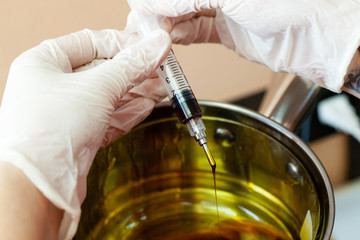 concentrated marijuana oil in a syringe