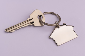 house keys on a pink background