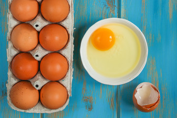 eggs (white, yolk, eggshell). Top view. copy space