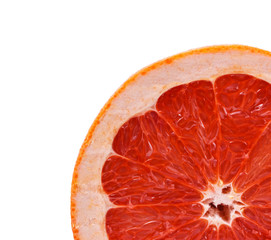 half grapefruit on white background close-up