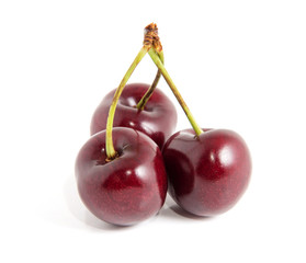 Sweet ripe cherry isolated on white background.