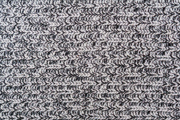 Background, texture - surface of a wool knitted fabric close up