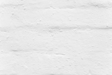 White Rustic Texture. Retro Whitewashed Old Brick Wall Surface. Vintage Structure. Grungy Shabby Uneven Painted Plaster. Whiten Facade Background. Design Element.