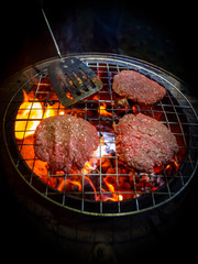 hamburger patty amateur bbq at night