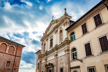 Obraz premium Baroque Church of San Giovanni De Duca, in Piazza Dante, Anagni, Frosinone, Italy. Cloudy blue sky.