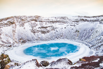 Kerid crater in Iceland with orange sky during sunset © RudiPereira