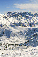 Winter landscape with hills covered with snow at Pirin Mountain, view from Todorka peak, Bulgaria