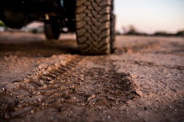 Fototapeta na wymiar tire tracks in dirt