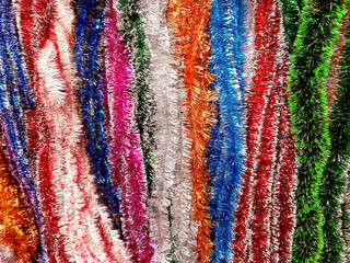 Obraz premium New Year - Christmas tinsel texture multi-colored