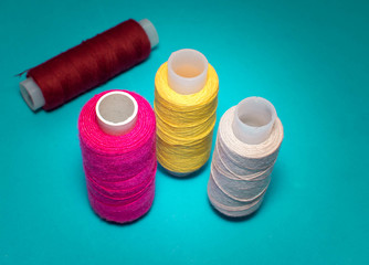 thread spools standing upright