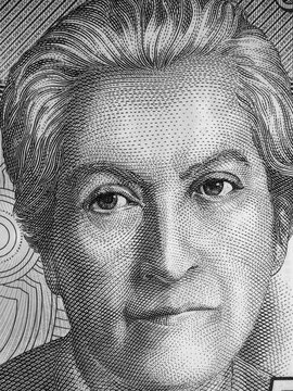 Gabriela Mistral portrait on Chile 5000 peso banknote close up. Chilean poet, 1945 Literature Nobel Prize winner. Black and white.