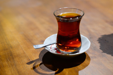 a turkish tea on wooden desk