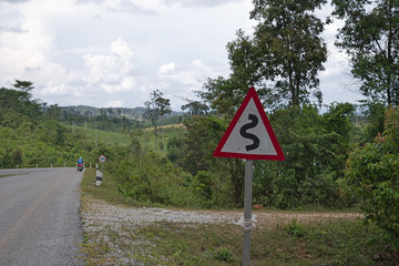 Curvy Road Sign In Laos