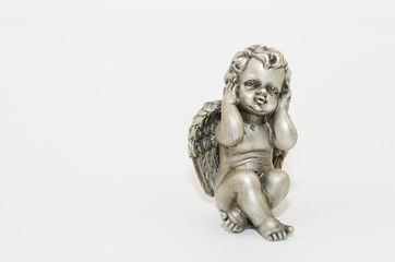 Fototapeta na wymiar Angel statue isolated. Angel wings. Little guardian angel. Christmas decoration. 