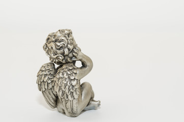 Angel statue isolated. Angel wings. Little guardian angel. Christmas decoration. 