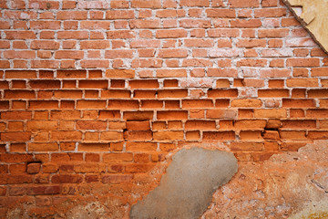 Old Eroded Damaged Plastered Brick Wall