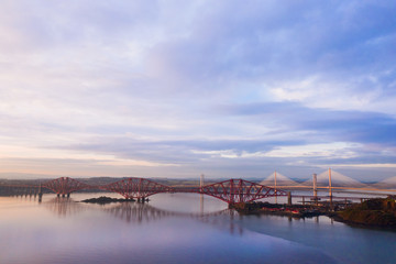 Fototapeta premium Three bridges, Forth railway Bridge, Forth Road Bridge and Queensferry Crossing, over Firth of Forth near Queensferry in Scotland