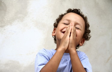 little boy praying stock photo