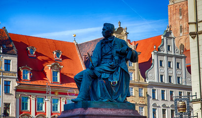 Monument to Alexander Fredro on Rynek Square in Wroclaw in Poland - obrazy, fototapety, plakaty