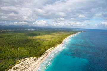 Coastal zone of the Dominican Republic. View from the cockpit of the helicopter.