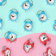Time is running out. Melted red alarm clocks