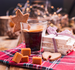 Fresh aromatic coffee and Italian Christmas sweets. Nougat with almonds, karemelnye sweets, ginger...