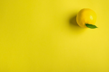 Lemon on yellow