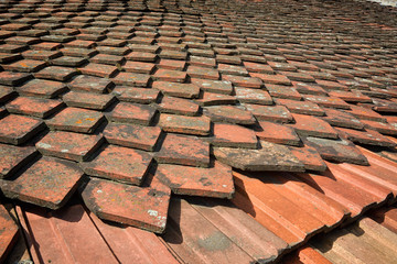 The texture of the old dirty tile roof