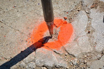 Geodetic survey mark set in concrete . ground marker.