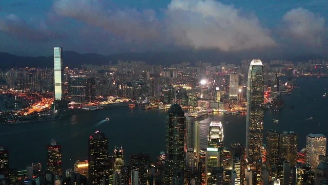 Aerial scene fly over Hong Kong victoria habour in sunset dusk scene 4k video