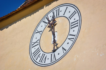 clock on the side of the Church