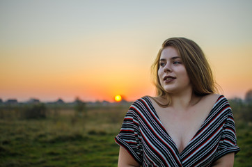Young smiling girl with curly hair