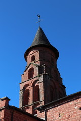 Fototapeta na wymiar Nouvelle Aquitaine - Limousin - Corrèze - Collonges-la-Rouge - Clocher de l' Eglise Saint-Pierre