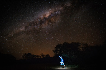 Obraz na płótnie Canvas touch the stars: background of starry sky
