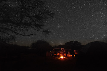 camp and bonfire under the stars
