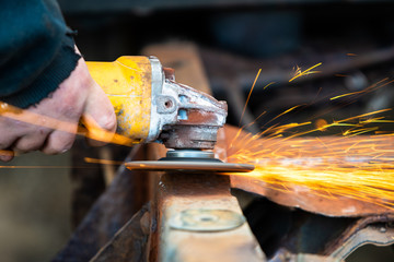 Grinder Being Held and Used 