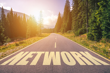 Network word written on road in the mountains