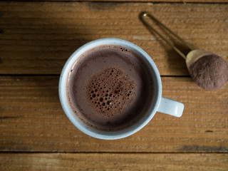 Hot cocoa in a ceramic mug. Warming hot chocolate perfect for Christmas morning or the winter months.