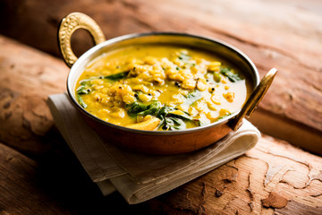 Dal Palak or Lentil spinach curry - popular Indian main course healthy recipe. served in a karahi/pan or bowl. selective focus - obrazy, fototapety, plakaty