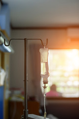 Saline bottles of patients in the hospital hanging on the stand