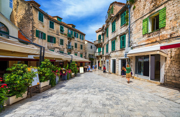 Fototapeta premium Street in Split historical center, Croatia. Beautiful square of the old town of Split in Croatia. Old stone street of Split historic city, Dalmatia, Croatia