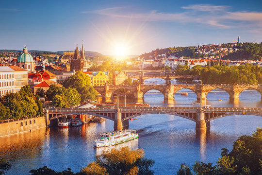 Prague Scenic spring sunset aerial view of the Old Town pier architecture and Charles Bridge over Vltava river in Prague, Czech Republic