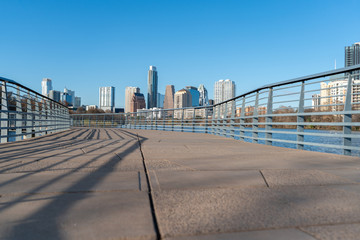 Low Angle View of River Boardwalk With Austin Skyline in the Background