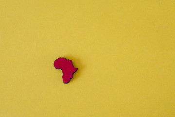 Africa pendent isolated against yellow background